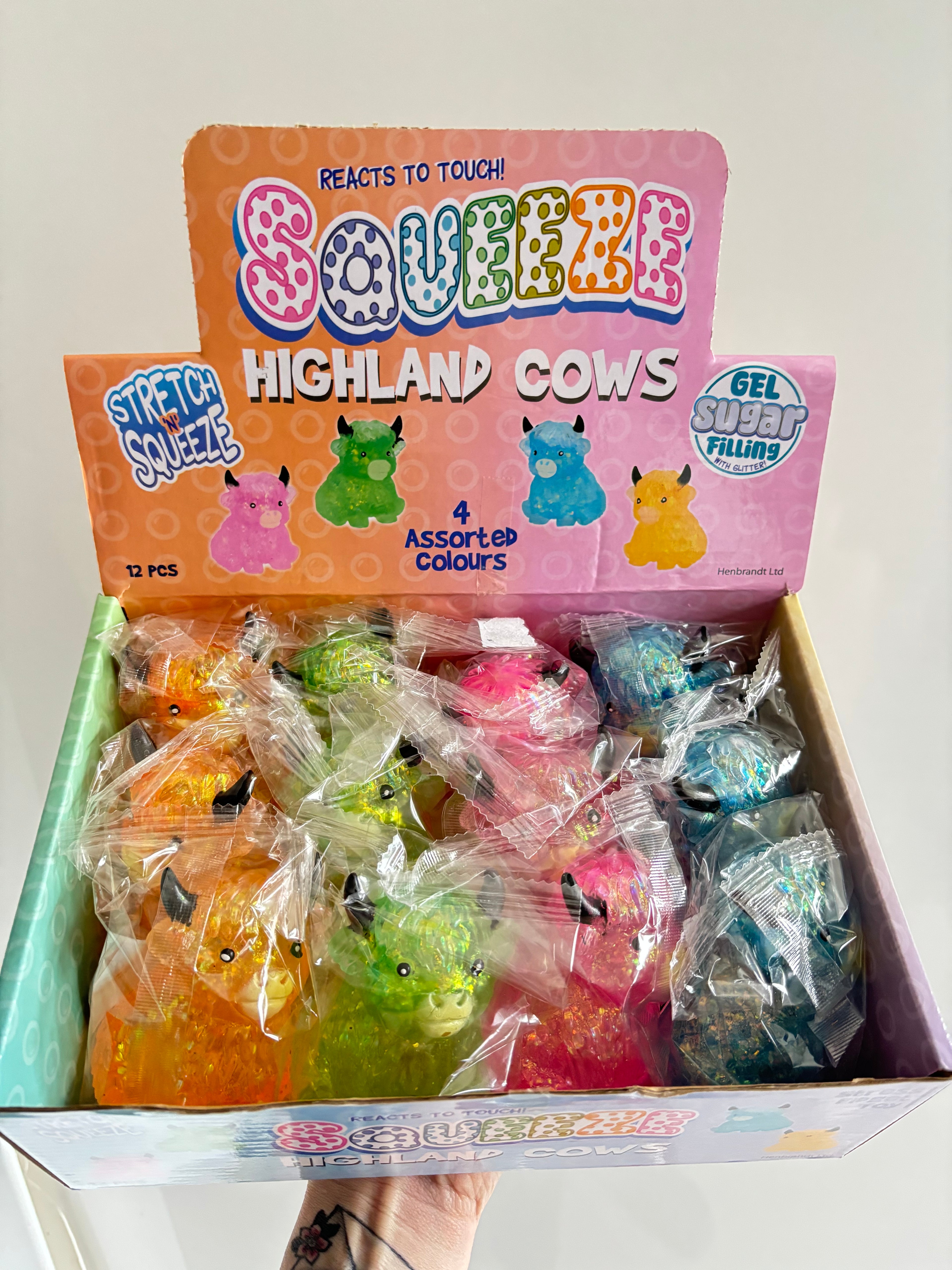 Squeeze Highland Cows