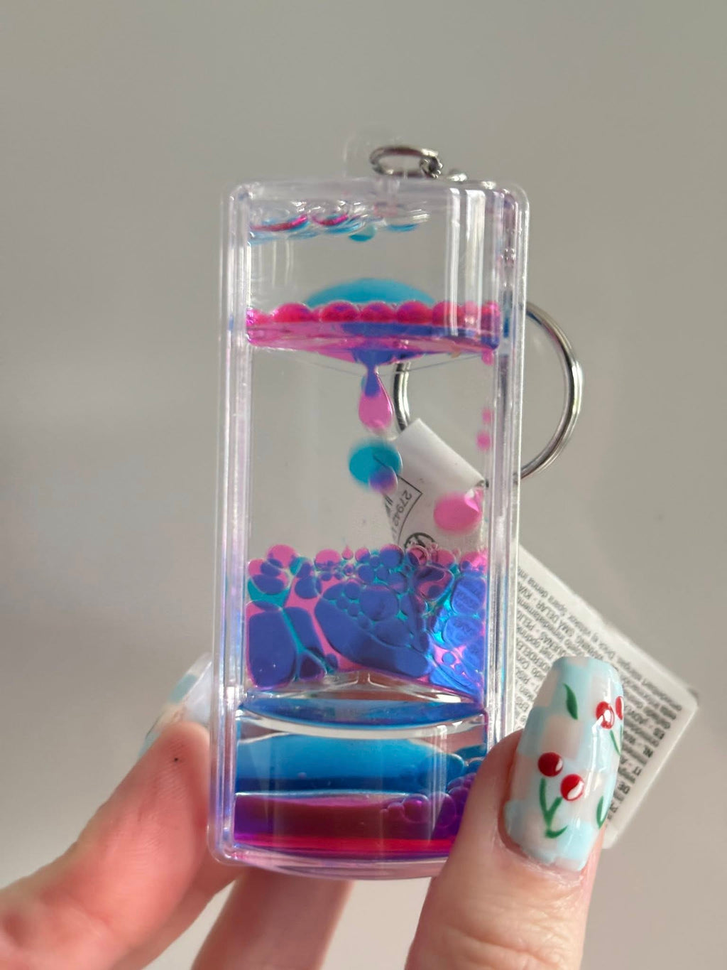 Liquid motion key chain